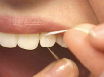 a person flossing