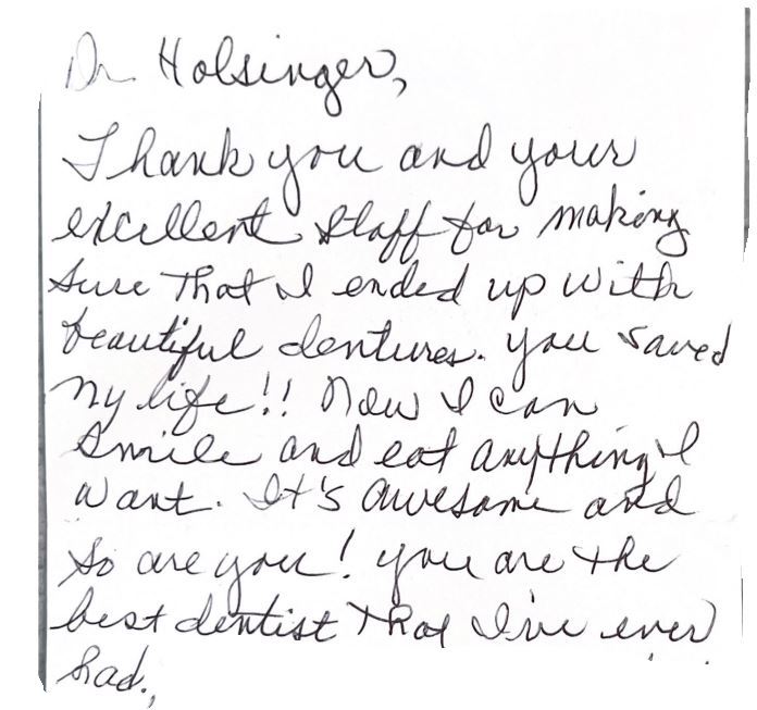 Handwritten note from patient saying thank you for excellent dentures